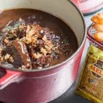 Pork cheeks with cherry beer and Meli honey cake - Meli